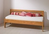 Dřevěná postel Tina